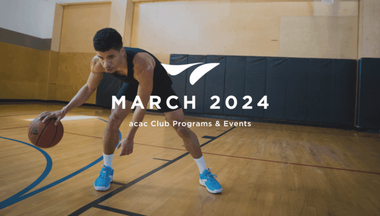 Basketball player dribbling on an indoor court during training session.